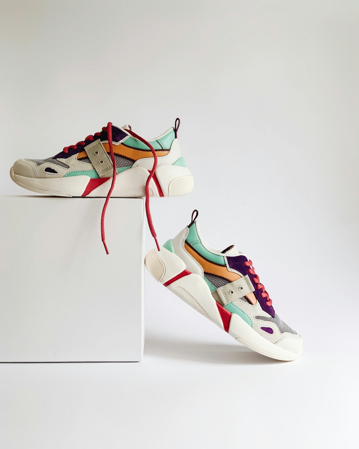 A fresh pair of running shoes resting on their box